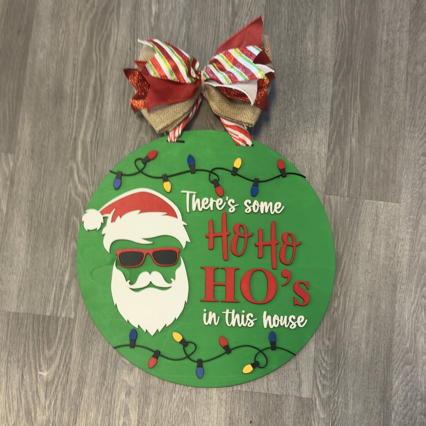 "There's Some Ho Ho Ho's in this House" Christmas Round Sign