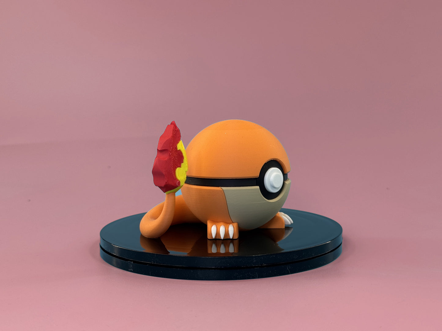 Charmander Inspired Ball — side view showing sphere profile and display stand